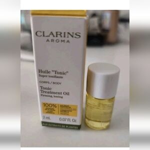 Clarins Tonic Treatment Body
Oil Firming Toning Huile Mini
2ml 0.07 fl oz NEW